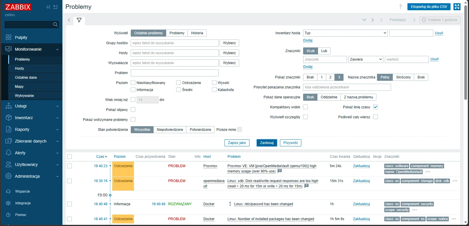 Zabbix, widok Problemy: filtry oraz lista bieżących problemów z poziomem, hostem, czasem trwania i znacznikami